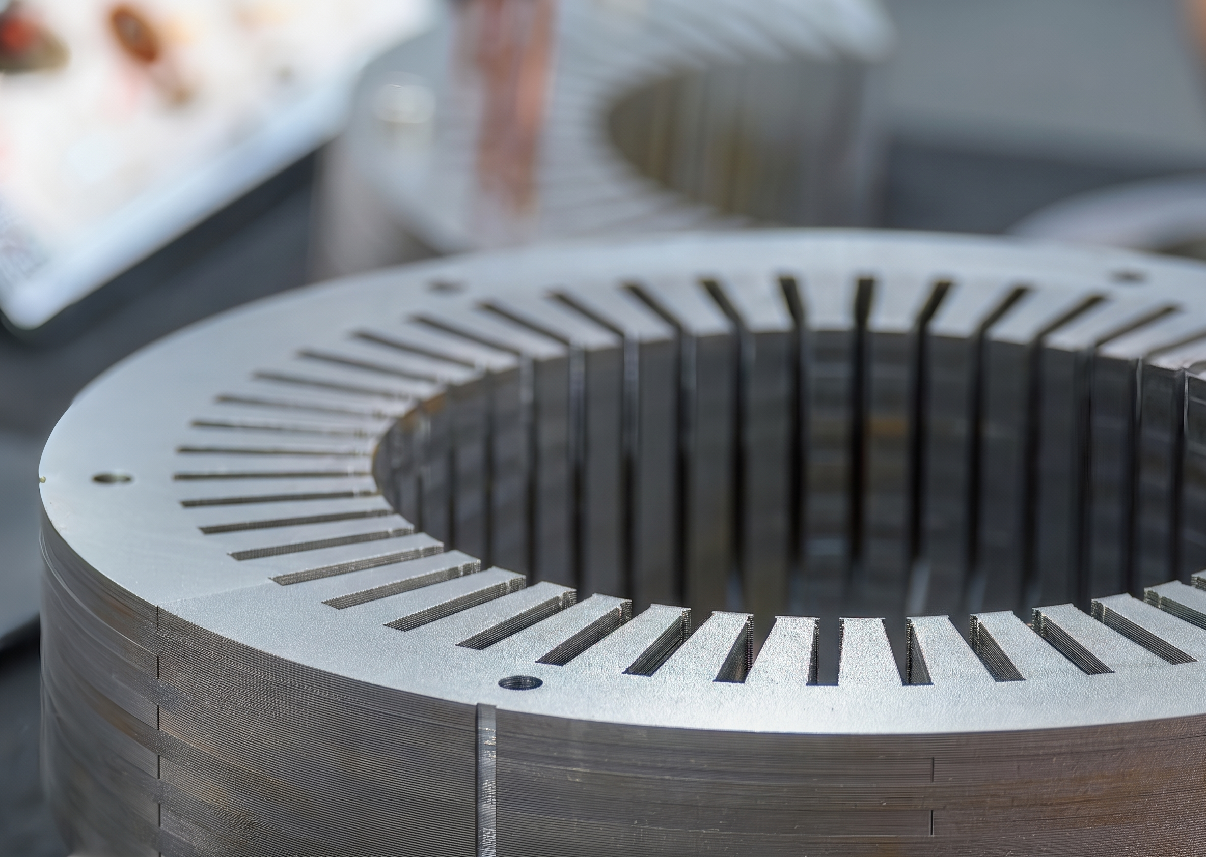 Stacked stator core with even teeth and clean lamination edges